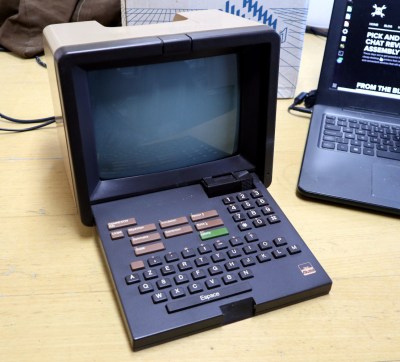 The Minitel terminal is a small CRT monitor with a fold-down alphanumeric keyboard.
