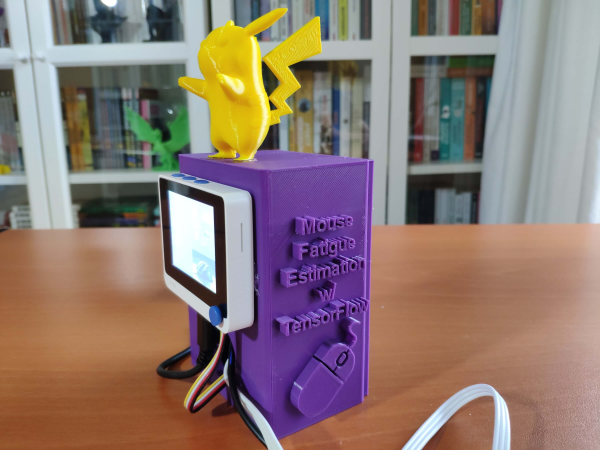 A purple 3D-printed case with an LCD screen on the front and Pikachu on top