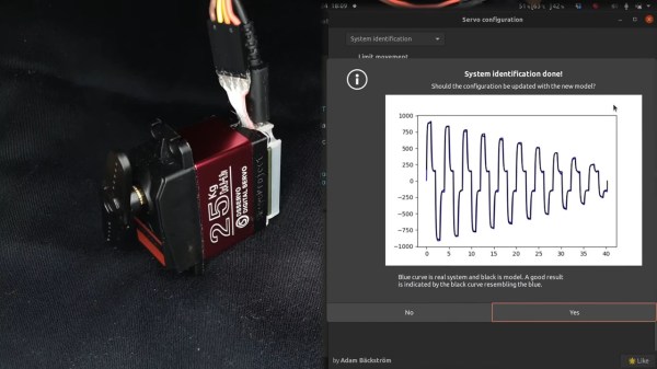The modified servo being calibrated on the left half of the screen, with some graphs of its operation being shown on the right half.