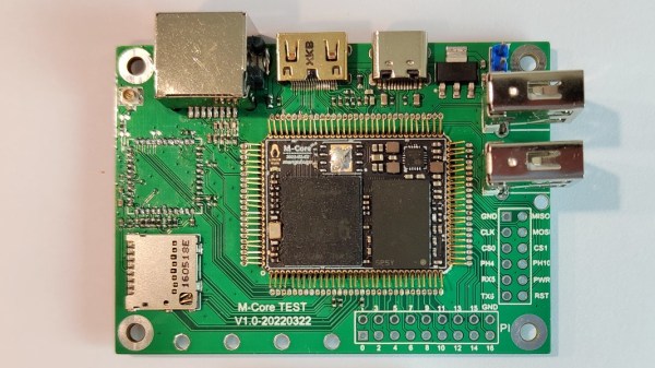 An M-Core module plugged into its devboard. Around it are Ethernet, HDMI, Type-C, two USB-A ports, one MicroSD card socket and one unpopulated footprint for a WiFi module