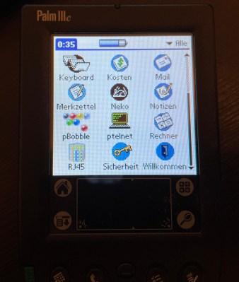 A Palm IIIc showing the main menu on its display
