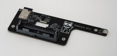 A black PCB with an ESP32 mounted on it