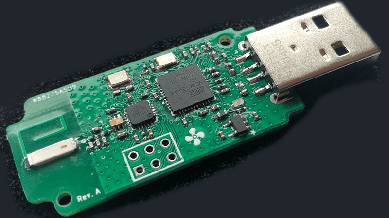 the dongle developed by Marcel, with a USB-A plug on one end and an SMD antenna on the other