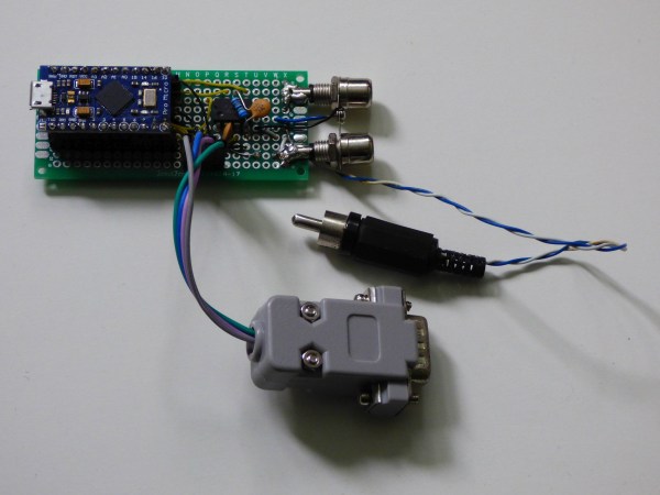 A PCB with an Arduino Micro Pro, RCA connectors and a sub-D connector