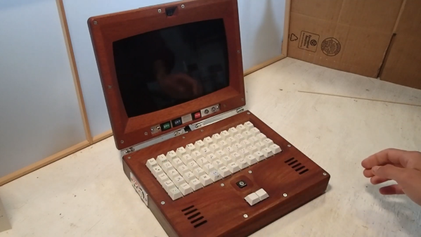 A laptop with a mahogany case