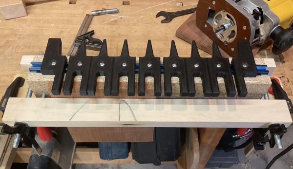 A wood-and-plastic jig to make dovetail joints