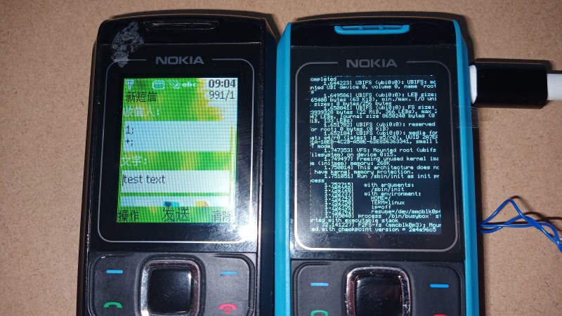 Two Nokia 1860 phones side by side - a Notkia-modded phone on the right, and an unmodified Nokia phone on the left
