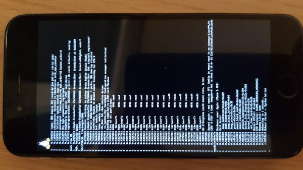 iPhone 6 with Linux boot log on its screen