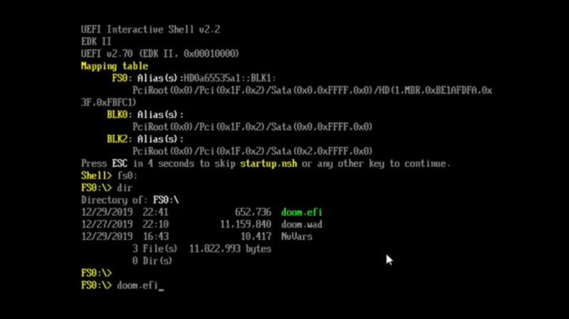 Screenshot of the EFI shell, showing doom.wad and doom.efi in 'ls' command output, and then doom.efi being loaded