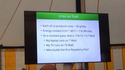 A slide saying: - Each of us produces urea ~30g/day; - Energy content 0.03*3871 = 116 Wh/day; -At a constant pace, that is 116/12 = 9.7 Watt; - My laptop runs on 7 Watt; - My TV Runs on 19 Watt; Who builds the first Raspberry Pee?