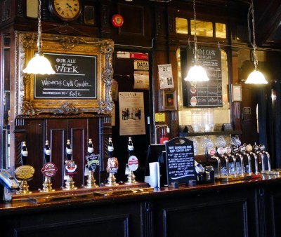 British pub interior showing pumps on bar