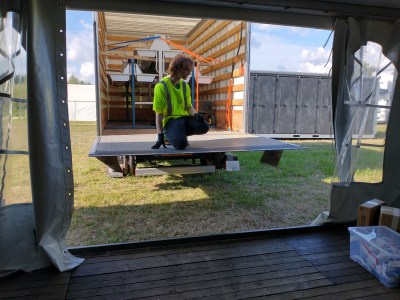 My Hackaday colleague Arya Voronova pausing for a moment during unloading.