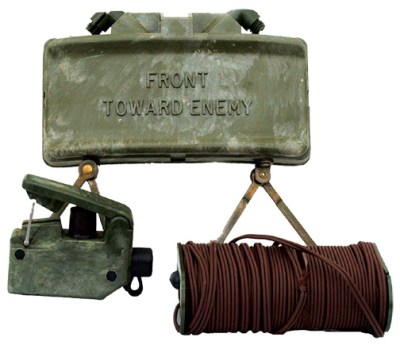 The M18A1 Claymore mine with the M57 firing device and M4 electric blasting cap assembly.