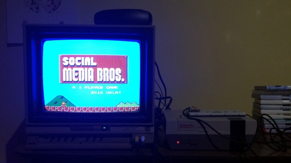 CRT TV screen showing a Super Mario Bros main screen with "Social Media Bros" written on the title screen instead. There's a NES console to the right of it, with a perfboard on top of it, wires going into the console port.
