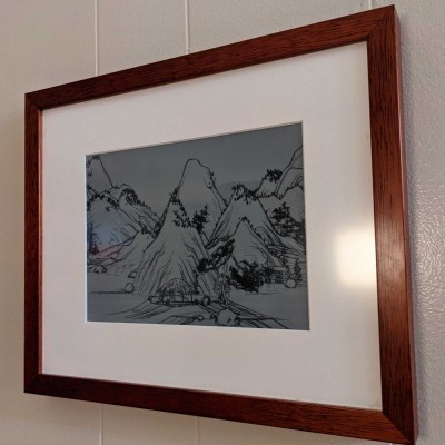 E-ink picture frame with infinitely scrolling landscape