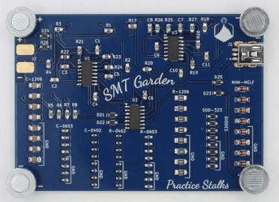 Back of "SMT Garden" PCB with only the 555 timer chips and inverter chip populated