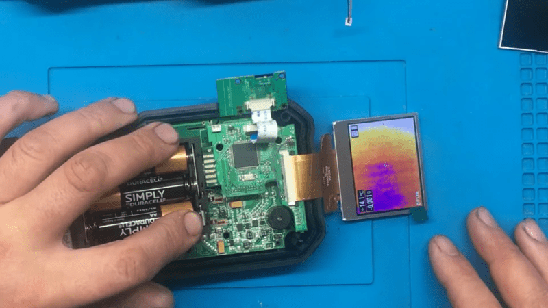 A working, partially disassembled thermal camera