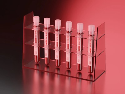 A rack of test tubes of blood-red paint