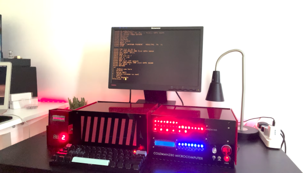 A homebrew computer built inside plexiglass cases with lots of LEDs
