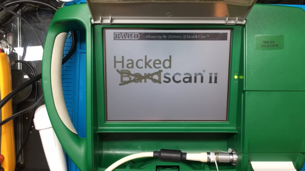 The display of a medical ultrasound scanner showing "HackedScan II"