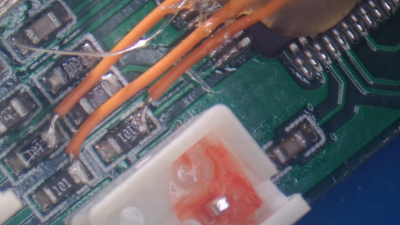 A PCB with a few mod wires on it