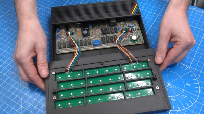 A new ZX Spectrum case, opened to show the keyboard connecting to the mainboard