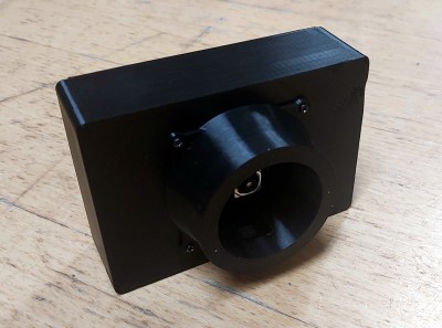 A black 3D-printed fairly traditional looking snapshot camera
