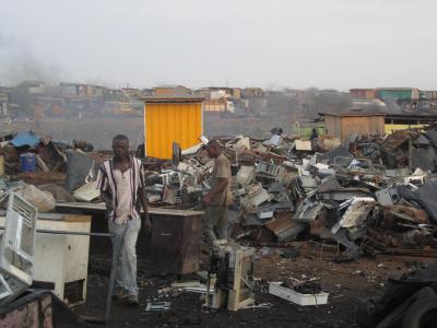 2011 photo of Ghanaians working in Agbogbloshie, a suburb of Accra, Ghana. (Credit: Marlenapoli)