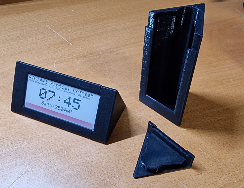 A clock with an e-paper display in a 3D-printed case