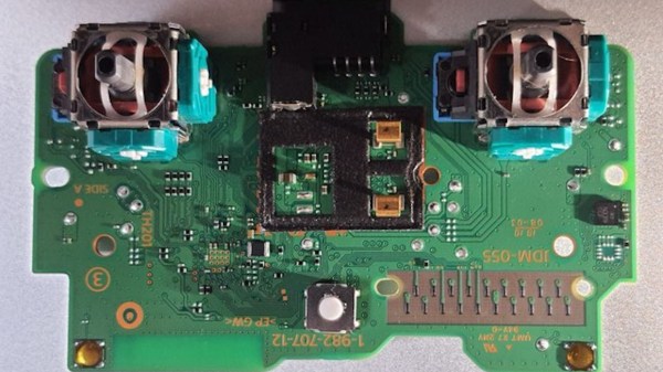 Picture of a DualShock 4 controller PCB, with two joysticks on the sides
