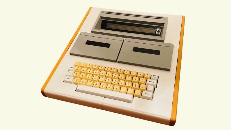 A visually accurate replica of the MCM/70 computer, an all in one system with a keyboard, dual cassette drives and a small one line display