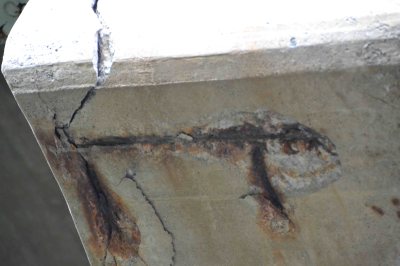 Degraded concrete and rusted, exposed reinforcement bar (rebar) on Welland River bridge of the Queen Elizabeth Way in Niagara Falls, Ontario. (Credit: Achim Hering)
