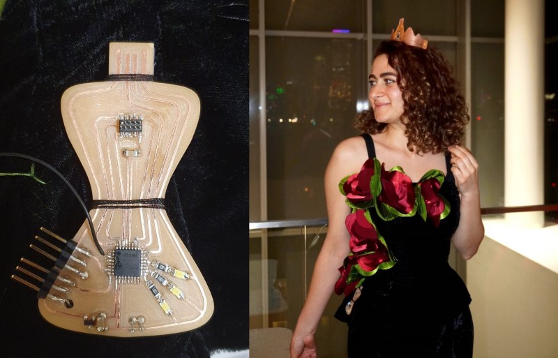 A milled PCB next to a woman wearing a dress that includes it
