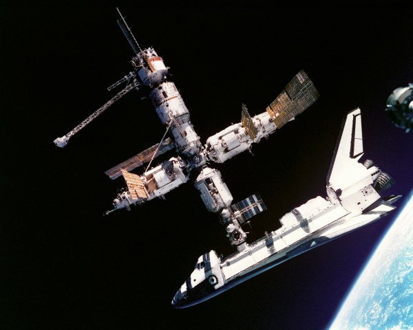 Space Shuttle Atlantis connected to Russia's Mir Space Station as photographed by the Mir-19 crew on July 4, 1995. (Credit: NASA)