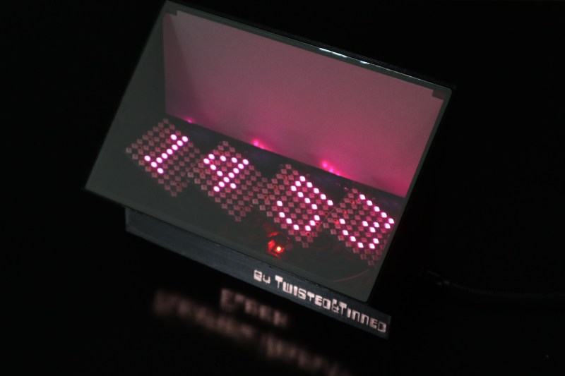 A clock made with LED displays and reflective film