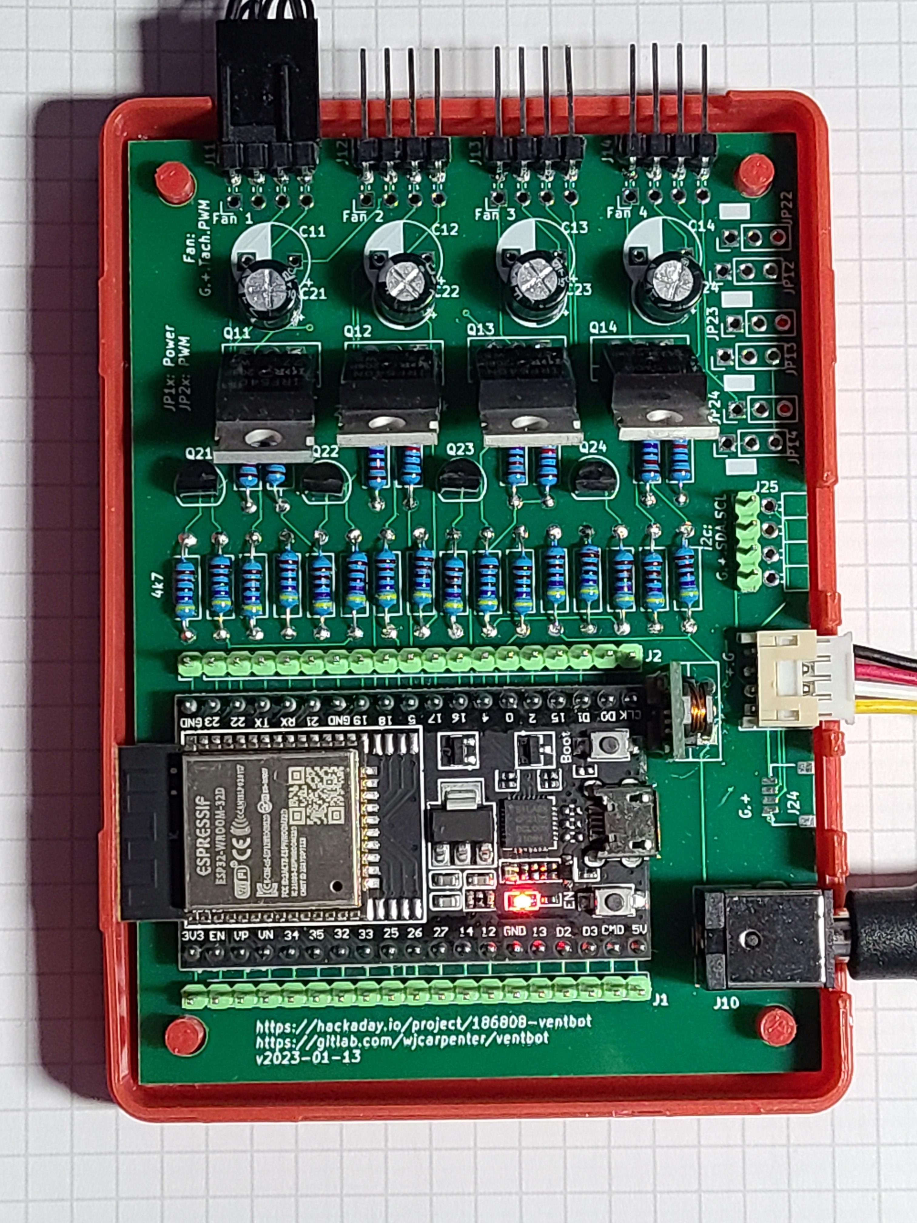 Ventbot control circuit board with ESP32 breakout in a red 3D printed case