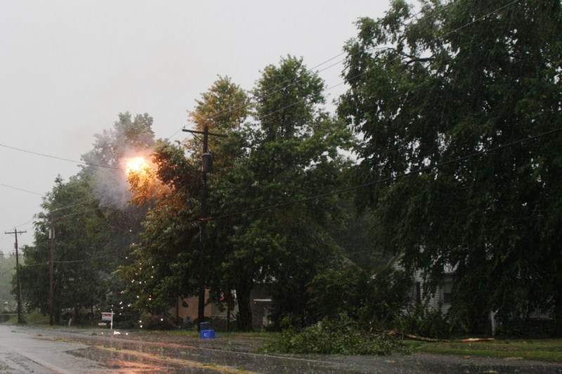  Crossed wires shorting out, Troy, Illinois. After a few minutes of sporadic arcing, the transformer down the street burned out. (Credit: Robert Lawton)