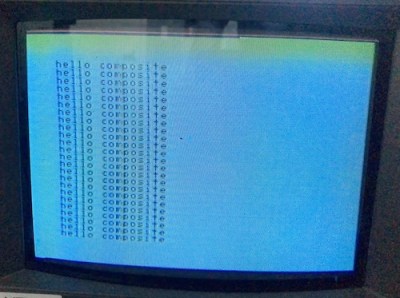 A CRT TV showing several lines reading "hello composite"