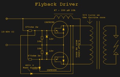 Schematic of a two transistor feedback oscillator driving a transformer.
