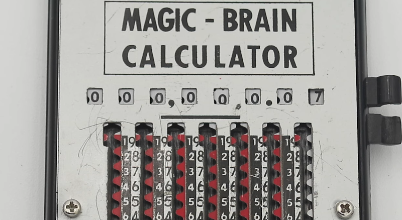 VINTAGE MAGIC BRAIN POCKET CALCULATOR WITH STYLUS And INSTRUCTIONS