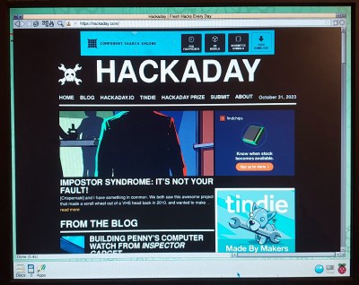 A screenshot showing Netsurf on the RiscOS desktop, displaying the Hackaday website.