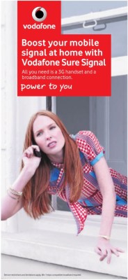 A woman leaning out of a window to get a phone signal, with the caption 'Boost your mobile signal at home with Vodafone Sure Signal'.