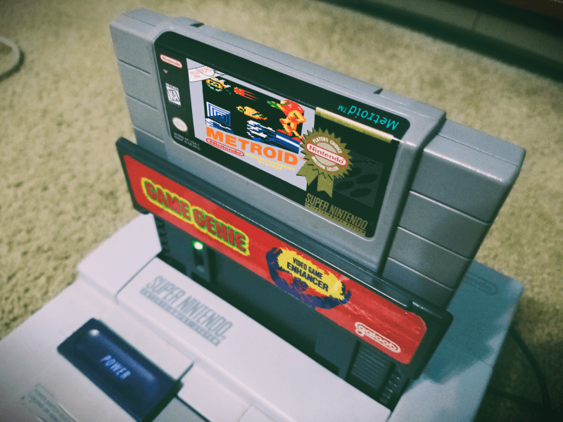 Photoshop image of the NES game Metroid on a Super Nintendo cartridge.