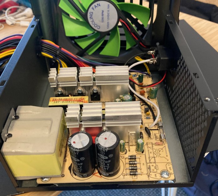 Cheap Computer PSU Puts On Weight With Box Of Iron | Hackaday