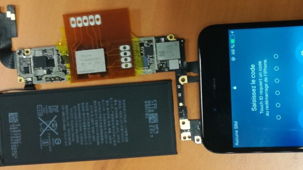 The FPC adapter shown soldered between the BGA chip and the phone's mainboard, with the phone shown to have successfully booted, displaying an unlock prompt on the screen