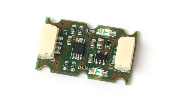 The I2C extender board on a white background, fully assembled, with two connectors and two indicator LEDs