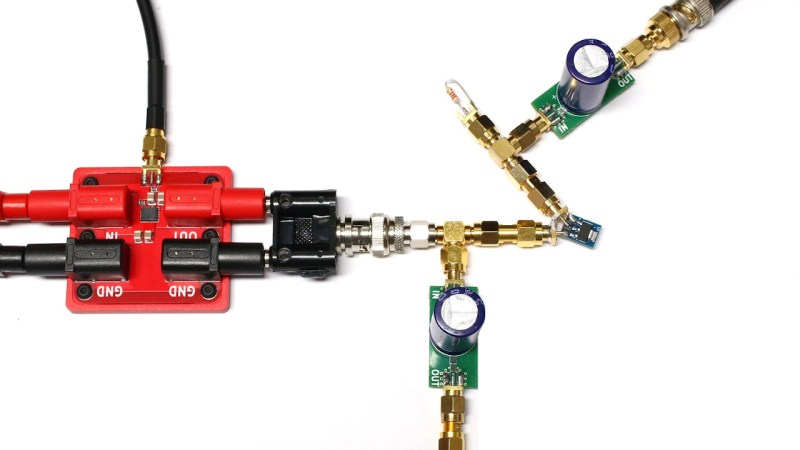 The line injector shown characterising the PSRR of an AMS1117 regulator, with a bunch of stuff connected to it through SMA jacks