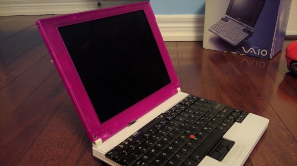 The laptop in question, with the LCD-bearing top half printed in pink, and the bottom half showing off the Thinkpad keyboard.