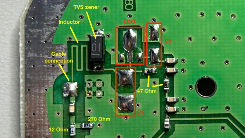 PCB of the antenna about to be modded, with components desoldered and different parts of the circuit highlighted