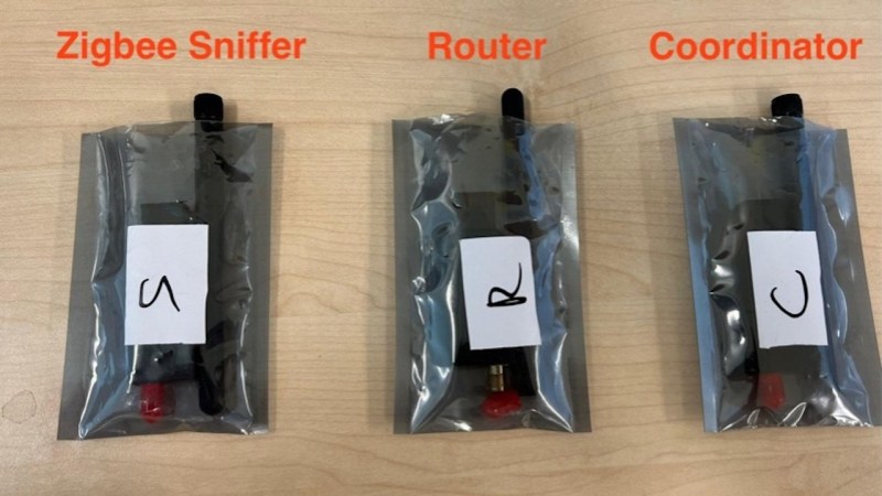 Three ZigBee radios in ESD bags, marked "Zigbee Sniffer", "Router" and "Coordinator".